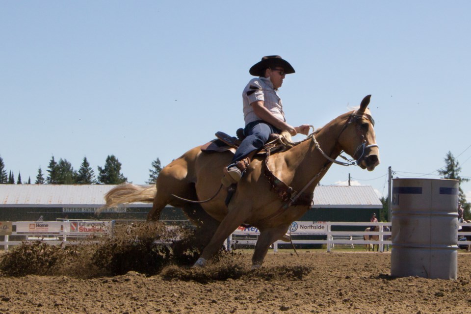 Aaron Alexander and his palomino quarter horse Fantasia Frost raced a 15.6 second barrel run at Laird’s new horse arena this weekend. AHA President Ashley Wonch said it’s the fastest recorded time for that arena. Photo by Jeff Klassen for SooToday