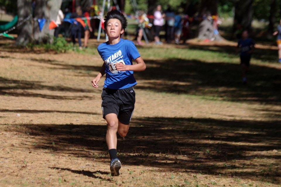 Xiaokang Cui takes first place in the 2.7k run. Runners young and old took part in the Soo Finnish Nordic Ski Club's annual Trail Trot on Sunday Sept. 29, 2024.