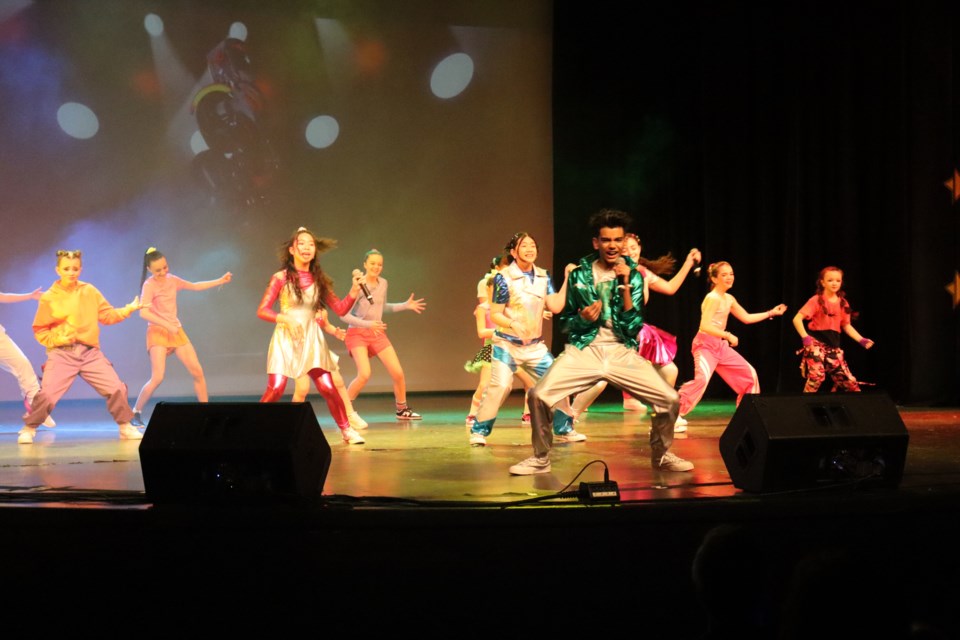 Youth from the local Elite Dance Force performed with the Mini Pop Kids at a Family Day concert Monday. 