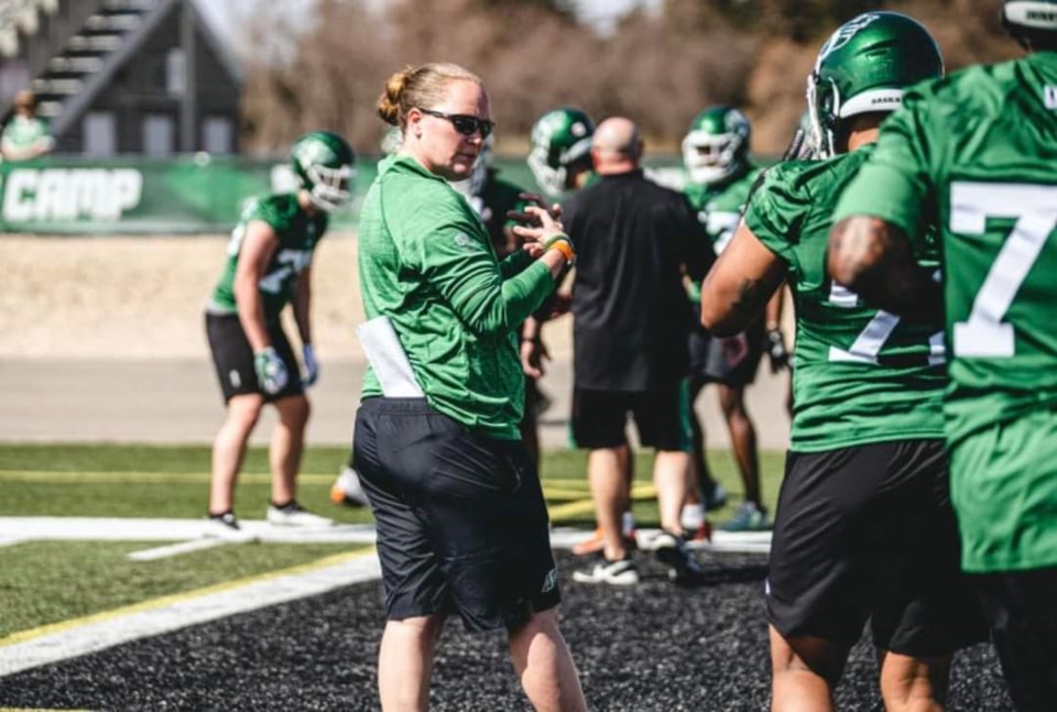 claire-dore-with-saskatchewan-roughriders