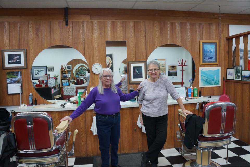 Janet Martinsen (right) and Danielle Childs on Friday morning, just before their first customers arrived.                            