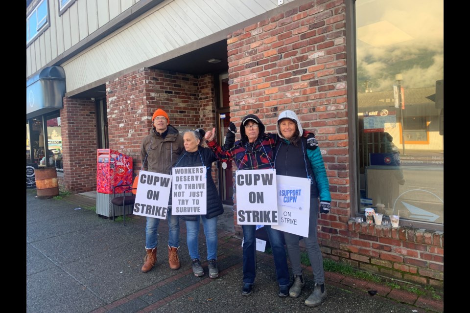 A picket line is up in downtown Squamish, in front of the post office.