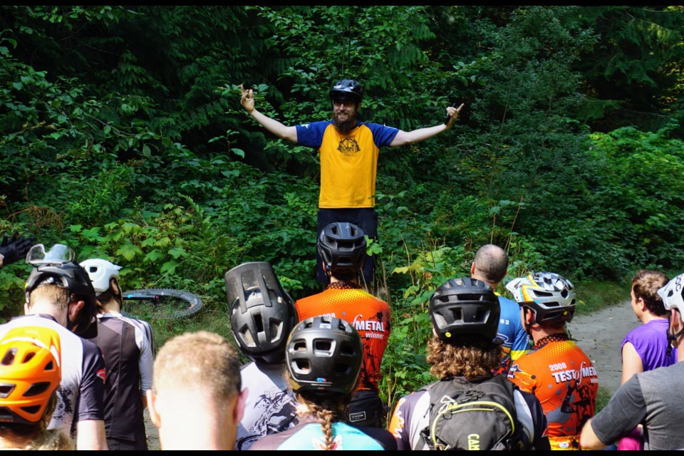 Bryan Raiser, race organiser addresses the crowd assembled for the Beyond the Valleycliffe of the Dolls.