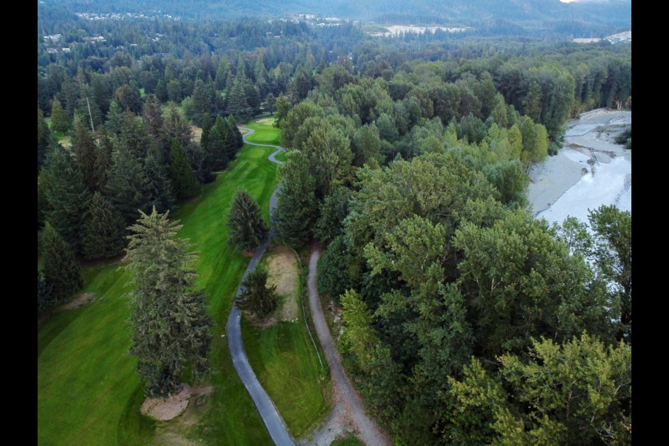 An aerial view of the Squamish Valley Golf Course and Mamquam River.