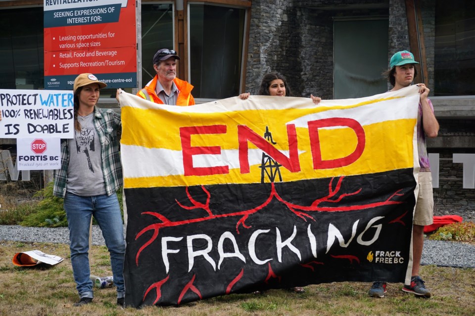               Demonstrators outside of MLA for West Vancouver-Sea to Sky's office at the Squamish Adventure Centre on Saturday, July 29, said they were there to raise awareness about the connection between the oil and gas industry and climate change.                 