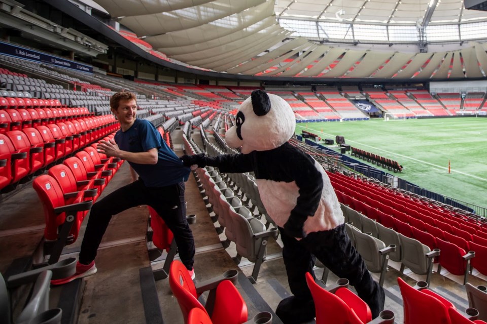  Shaun Stephens-Whale with the WWF-Canada panda at BC Place. 