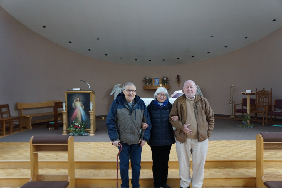 Clem Wippich, Vida Giroux and Paul Schilling at St. Joseph's church on Friday.                                      