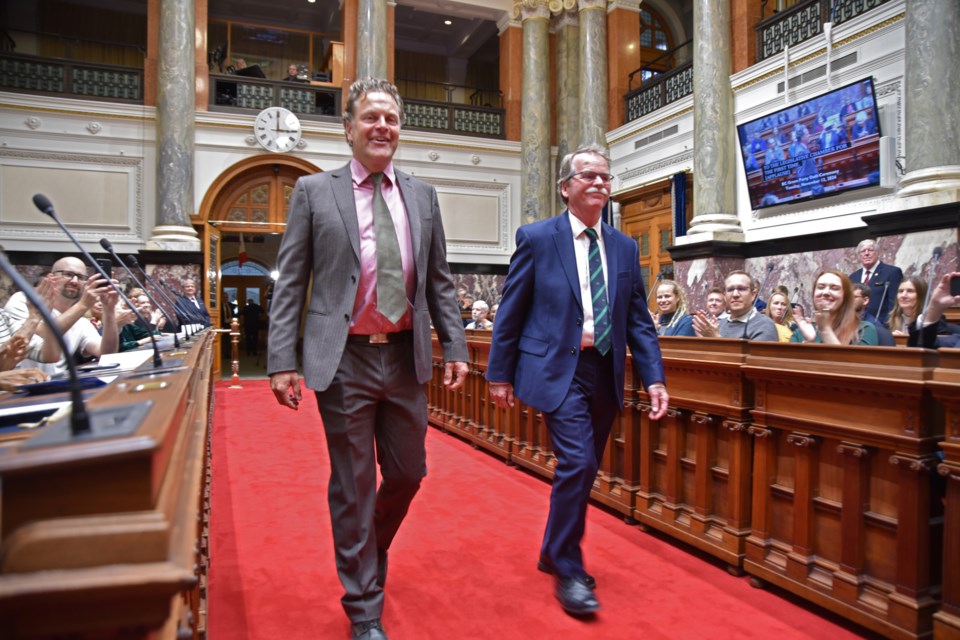 West Vancouver-Sea to Sky MLA Jeremy Valeriote during his swearing-in ceremony, as supporters— including Mayor of Squamish Armand Hurford—look on.