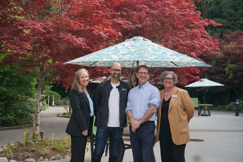 L-R: Jen Ford,  Whistler Councillor and UBCM past president, who is running to be NDP MLA; Mayor Armand Hurford, Minister Adrian Dix and PJ Jappy-Loker, director at Vancouver Coastal Health.