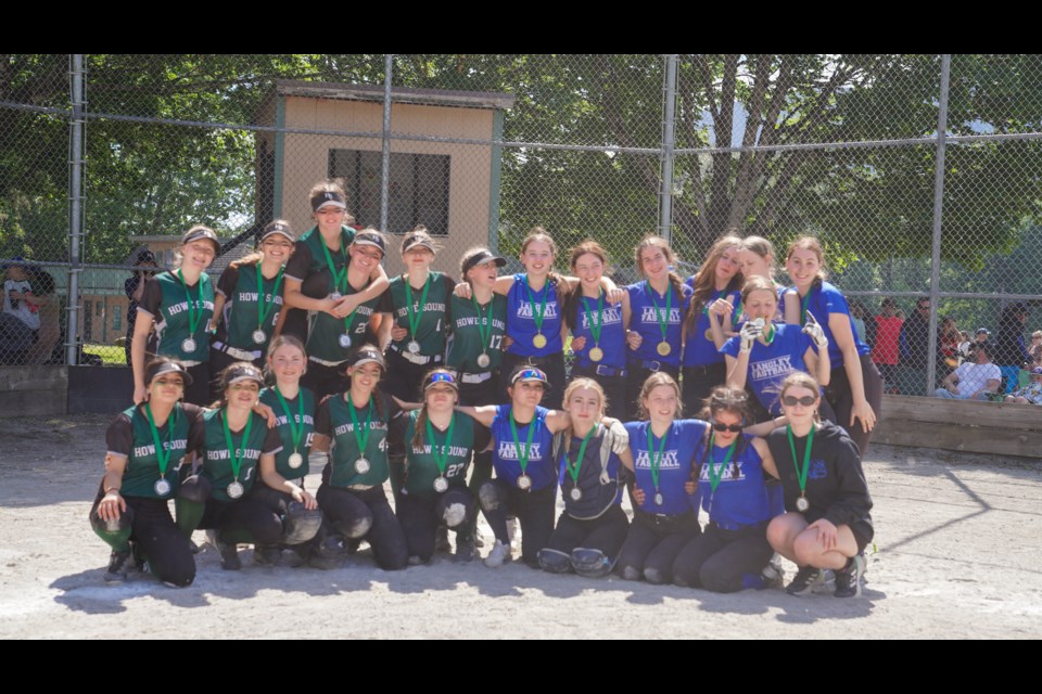 Squamish's U17 Venom softball team celebrate silver, with the Langley Bulldogs, who took gold, at the Sea to Sky softball tournament hosted by Howe Sound Minor Ball this past weekend. 