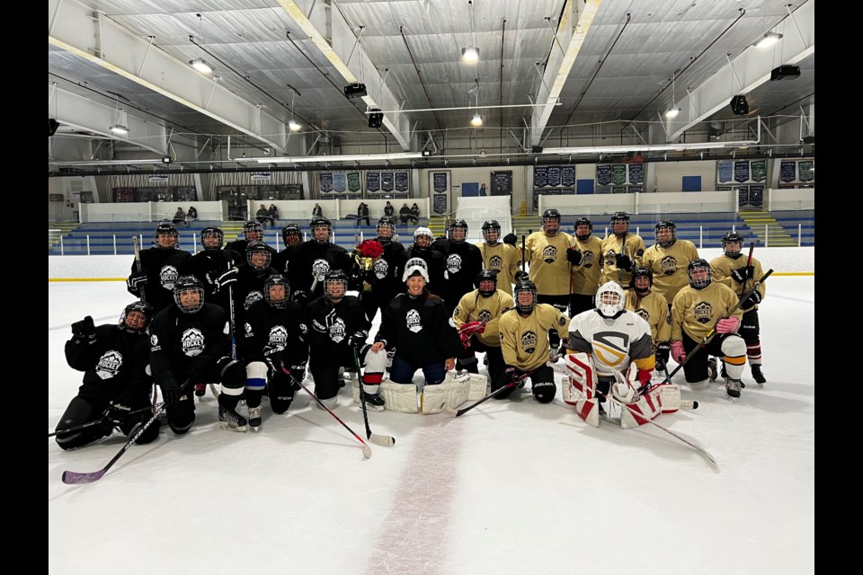 The two teams in the Squamish Women's Hockey Academy, Holiday Cup.