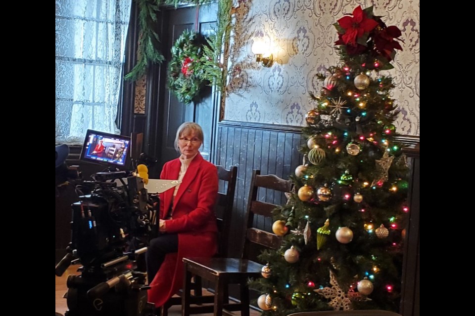 St. Albert actor Maureen Rooney preps for a scene in Meet Me At the Christmas Train Parade, a holiday romance filmed at Fort Edmonton Park and Villeneuve. 