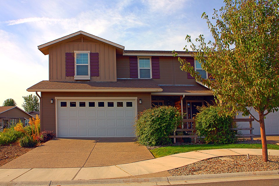 house-and-driveway-in-suburban-neighborhood-2023-11-27-05-02-44-utc