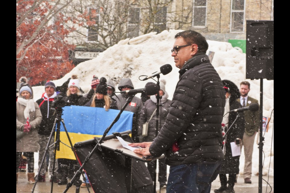 Deputy Mayor Harjinder Nijjar looks out at the crowd during his remarks Saturday.          