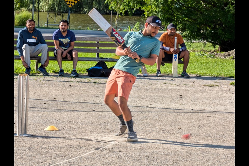 Vivek needed to show some fancy feet to sidestep a wayward bowl. The game these friends gather for is different than traditional cricket in many ways, but they've made it their own.