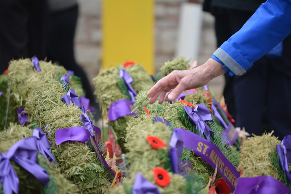 Citizens were invited to lay their poppies on the wreaths of the Cenotaph.