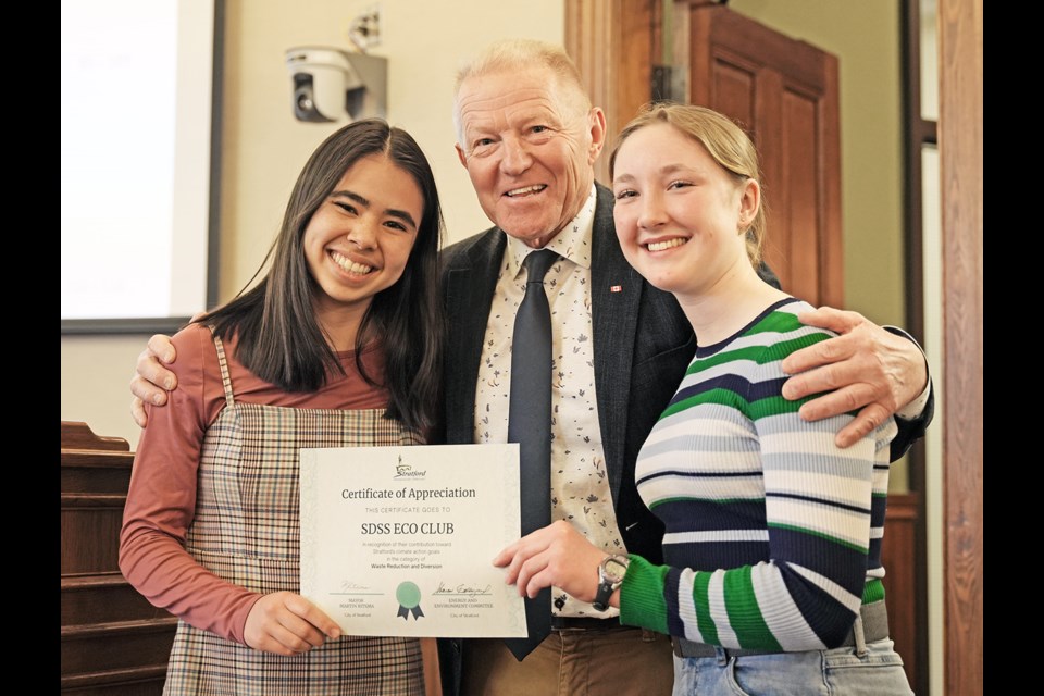 Lucy Chung, Mayor Martin Ritsma, and Sammie Orr of the SDSS eco club.