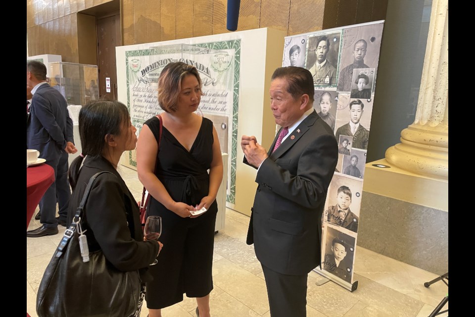 Helen Lee, left, and Keira Loughran at the 100th anniversary commemoration of the Exclusion Act at the Senate of Canada.