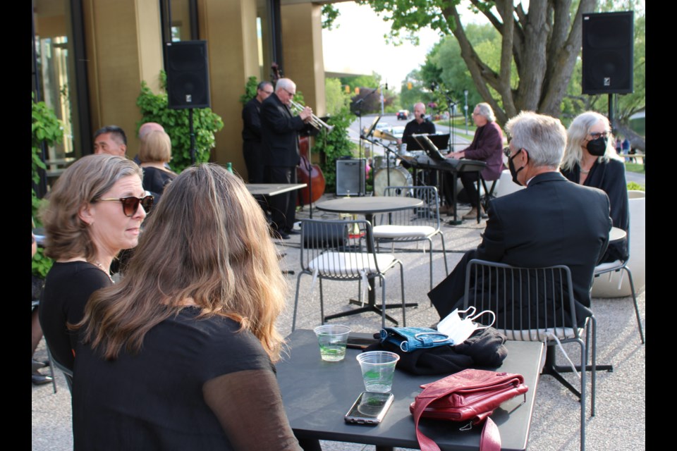 Audience members relax before the show. 