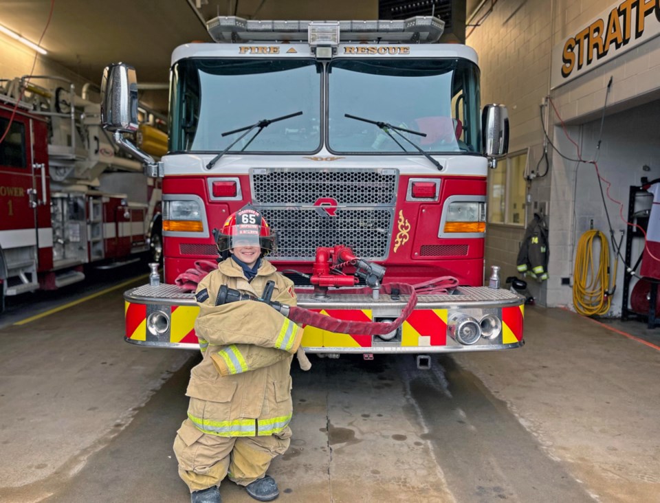 2asher-in-60lbs-of-firefighter-gear