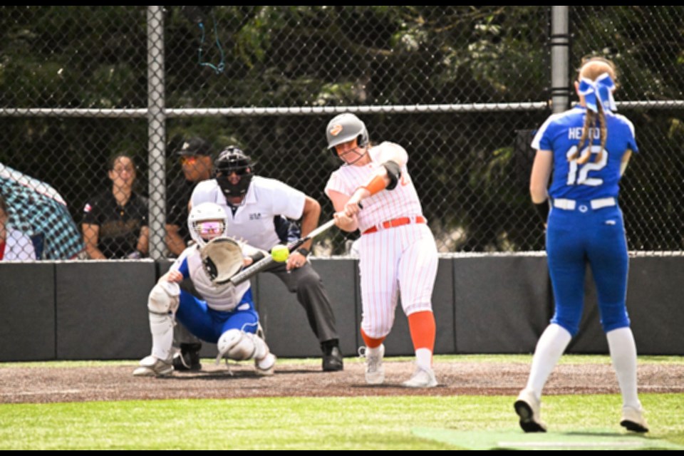 Karlee Satchell connects at the plate.