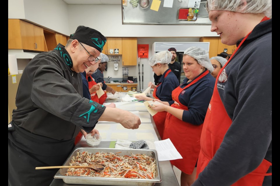 Learning from one of the best, Chef Wolfman