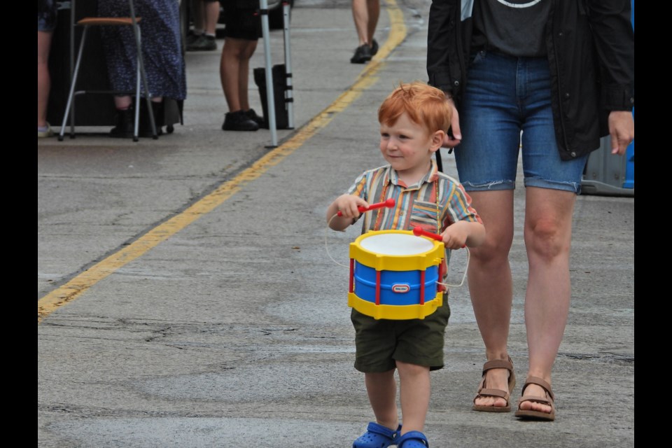 Rain or shine, the bands played on during Stratford Live Music and Food 2024 - even young Grady Belfour, who was drumming along with some pipe music Sunday morning.