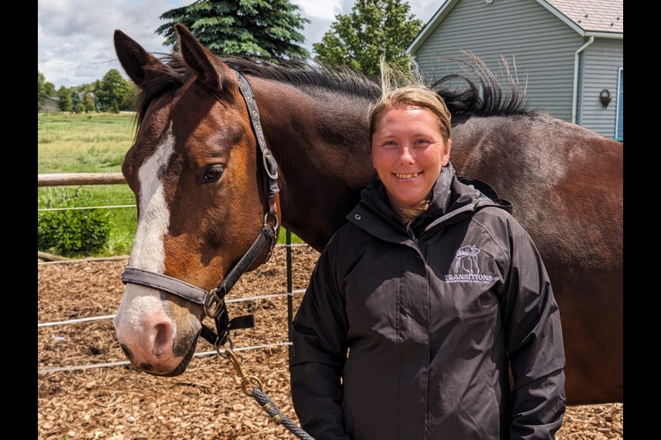 Transitions Equine Assisted Learning owner and operator, Alisha Wilson, joined by Thunder.