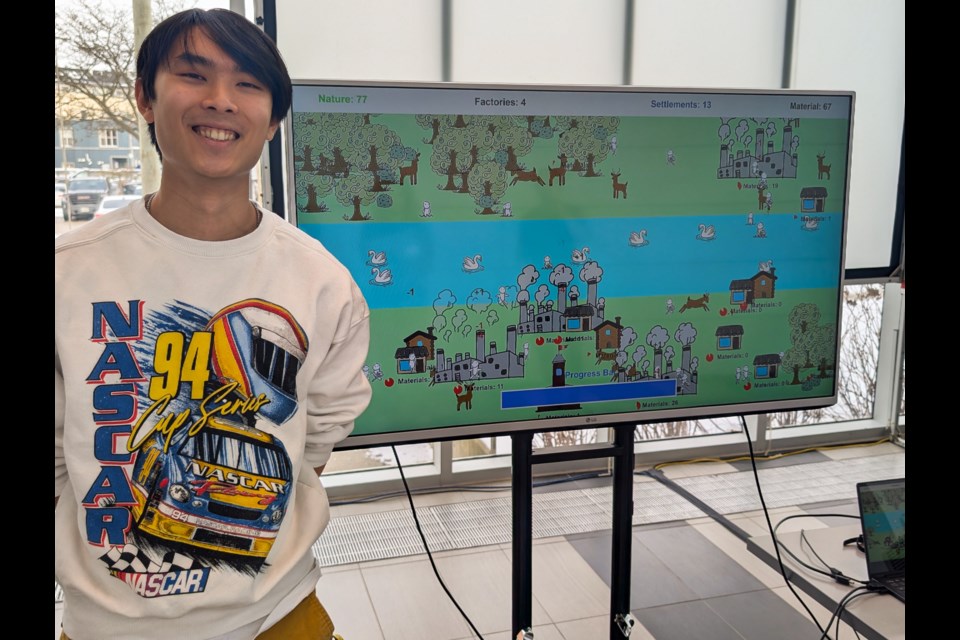 A Living Entity tech lead, Caden Chan, gave a demonstration of his team's 'Lights On Stratford' installation where the audience sees man's impact on the Avon River. Three teams were selected to represent the University of Waterloo's Stratford campus in this year's festival.