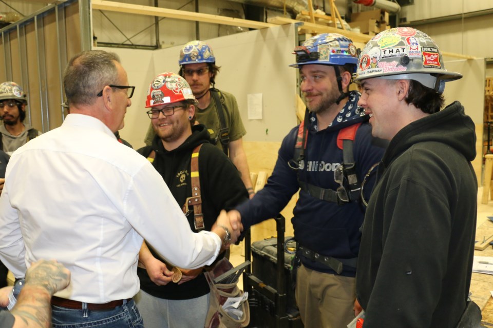 Ontario Northern Development Minister Greg Rickford meeting with carpenters at the Local 2486 Carpenters and Joiners Union building in Azilda on Jan. 16.