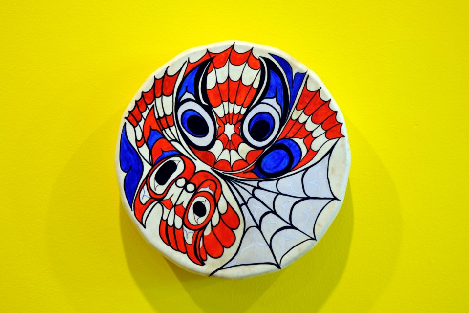 “When Raven Became Spider, Issue 1, Vol. 1” (2003) by artist Sonny Assu lends its name to the entire travelling exhibit currently hanging at the Art Gallery of Sudbury. The piece is acrylic on deer-hide drum. (Ella Myers)