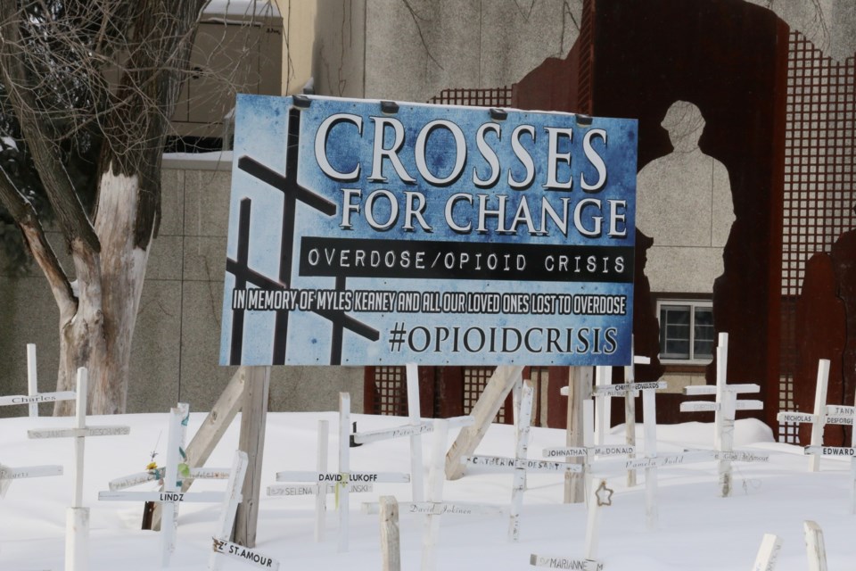 The Crosses for Change memorial in its current location at the corner of Brady Street and Paris Street.