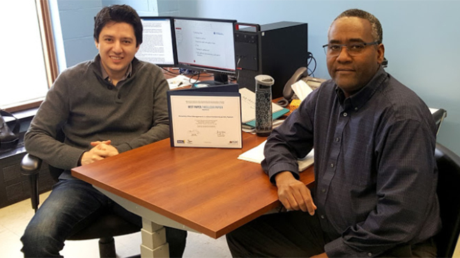 Dr. Amirmohsen Golmohammadi and Dr. Mohamed Dia with their Certificate of the Best Paper Award received from the Production and Operations Management Division of ASAC 2018