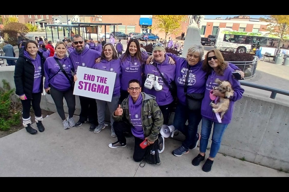 The DEK Foundation led a walk to raise overdose awareness to city hall on Saturday. 