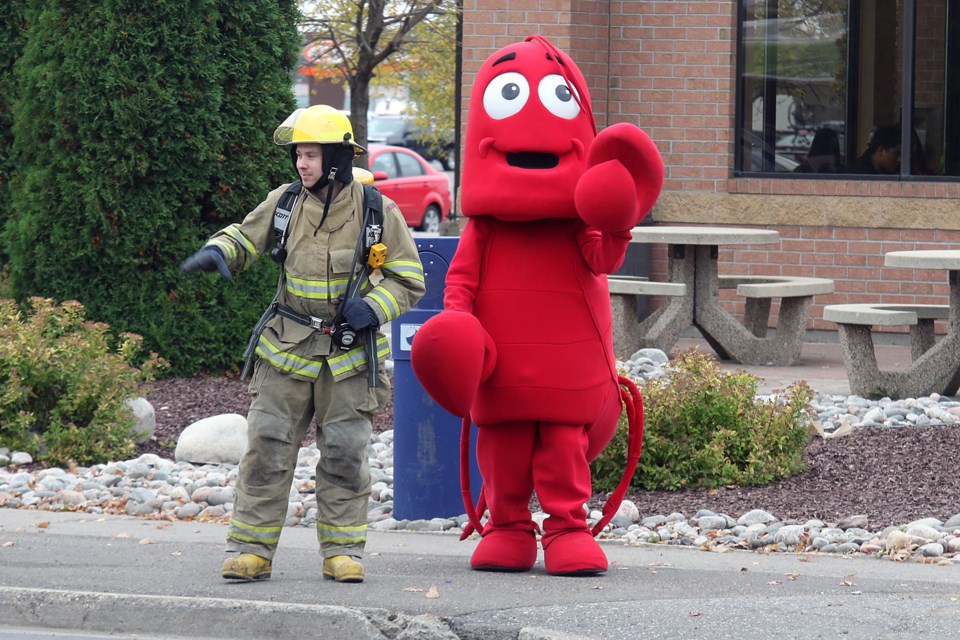 The Fire Lobster is a character in the video game The Great Escape, designed to teach children between the ages of four and six the best way to get out of their house if a fire strikes. A demonstration of the game was shown on Saturday at Wendy's on Memorial Avenue in Thunder Bay, part of Fire Prevention Week (Leith Dunick, tbnewswatch.com). 