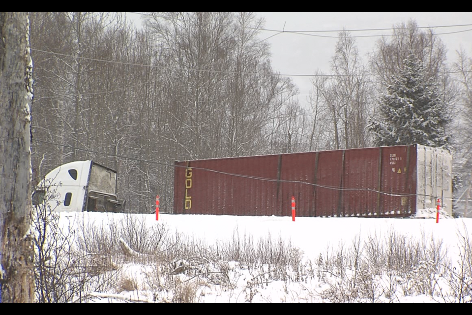 The operator of this tractor-trailer unit had to stay in his cab until hydro lines were de-energized (Kayla Karim/TBTV photo)