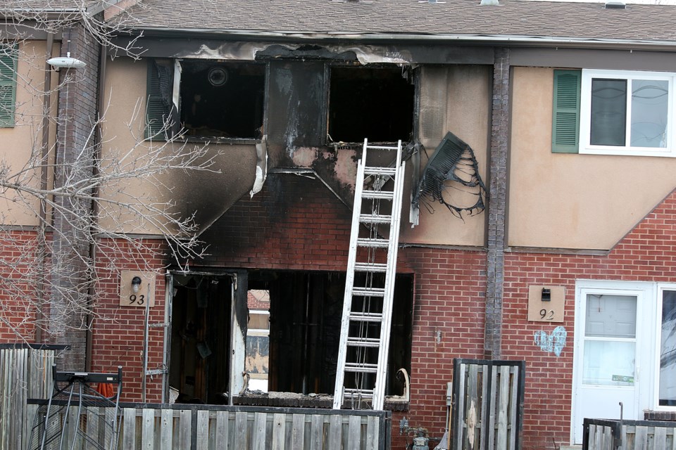 Fire tore through this Limbrick Street row house on Saturday, March 18, 2017 (Leith Dunick, tbnewswatch.com). 