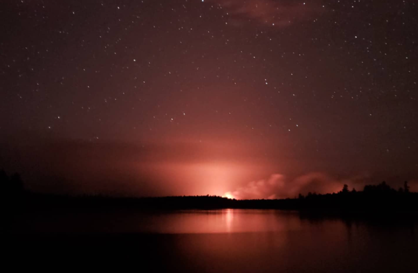 This photo showing a forest fire on the horizon was taken last week at the Prairie Portage Remote Ranger Station in Quetico Provincial Park (Chris Stromberg/Heart of the Continent Partnership)