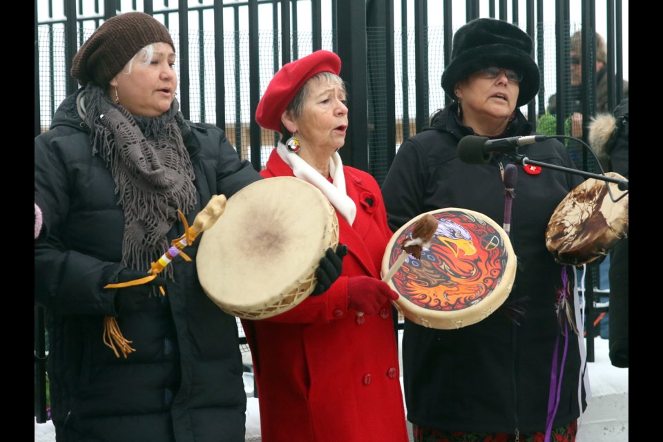 Renee Tookenay (left), Rita Fenton (middle), and Shelia Karasiewicz (right) perform the Giving Song during the Remembrance Day service at Mount McKay. (Photos by Doug Diaczuk - Tbnewswatch.com). 