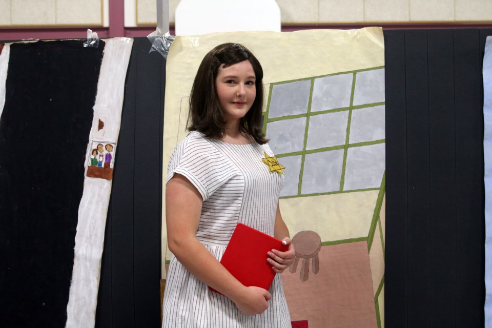 Grade 8 student, Rachel Perzan, chose Anne Frank for her wax museum report. Rachel was one of 79 grade 7 and 8 students at Nor'Wester View School participating in the wax museum, part of the launch for the schools new academies program. 