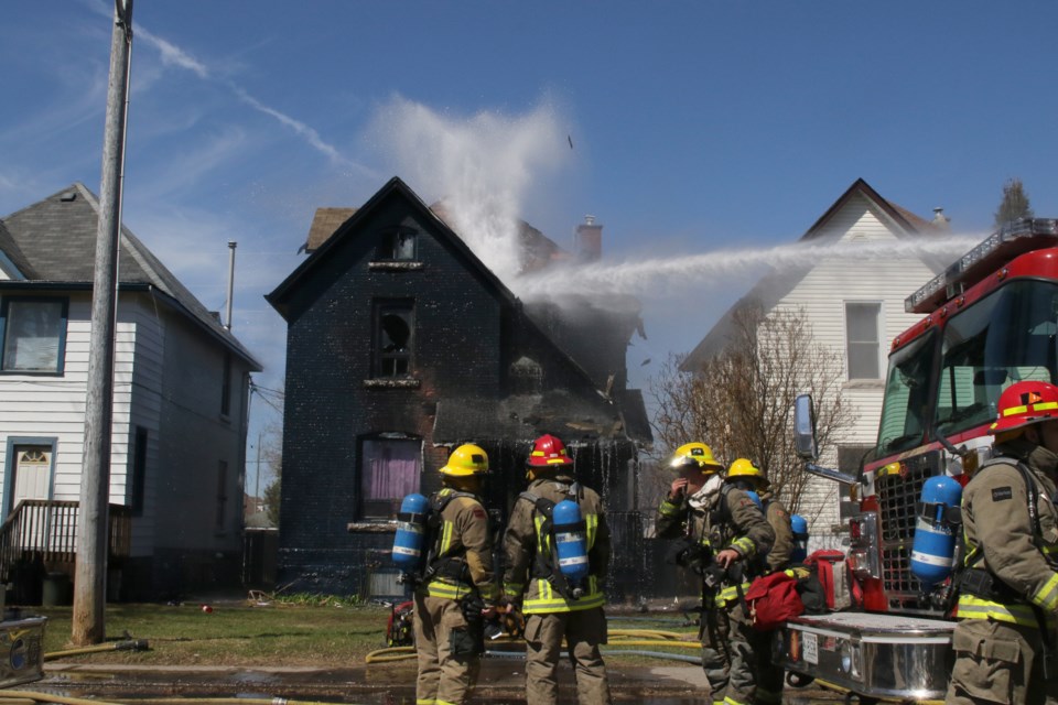 Firefighters managed to contain an early morning blaze that left a Marks Street home with extensive damage. (Michael Charlebois / tbnewswatch)