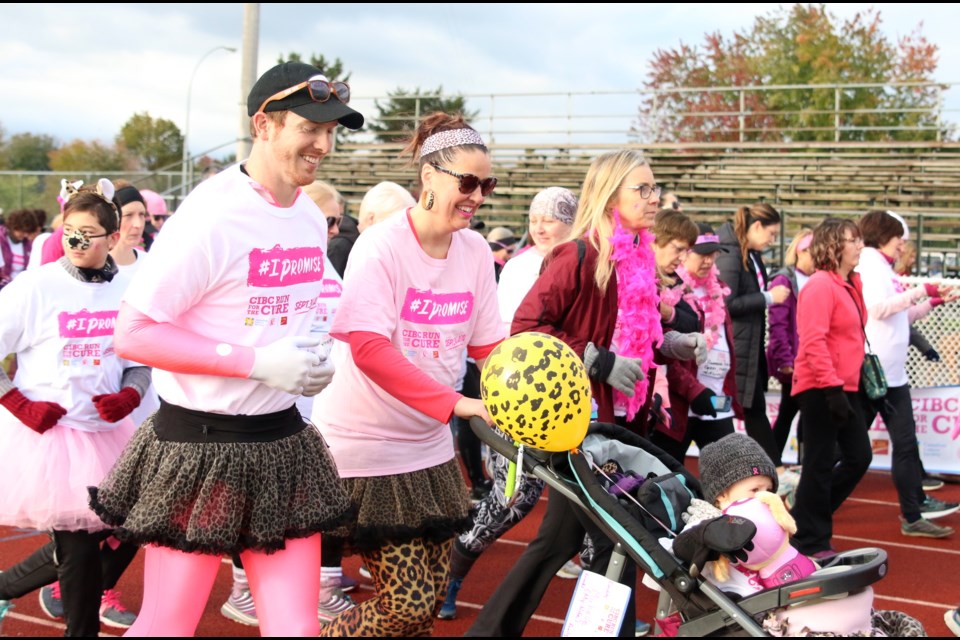 Michelle Blackburn (middle), a eight-year breast cancer survivor, was one of nearly 500 people participating in the 22nd Annual CIBC Run for the Cure on Sunday. (Photos by Doug Diaczuk - Tbnewswatch.com). 