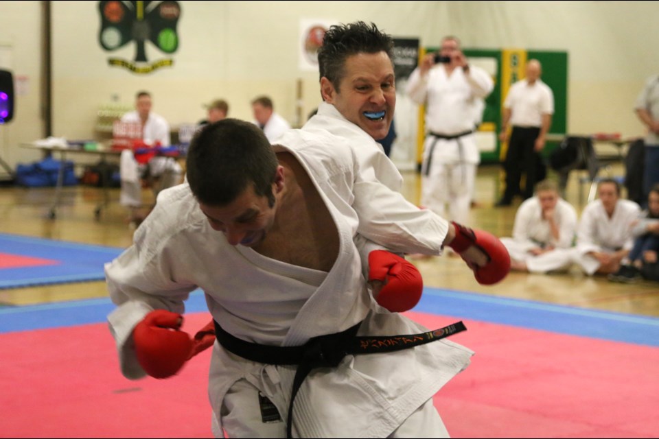 Black belt Danyle Copetti spars with an opponent during the Hoku Shin Karate Club Tournament on Saturday. (Photos by Doug Diaczuk - Tbnewswatch.com). 