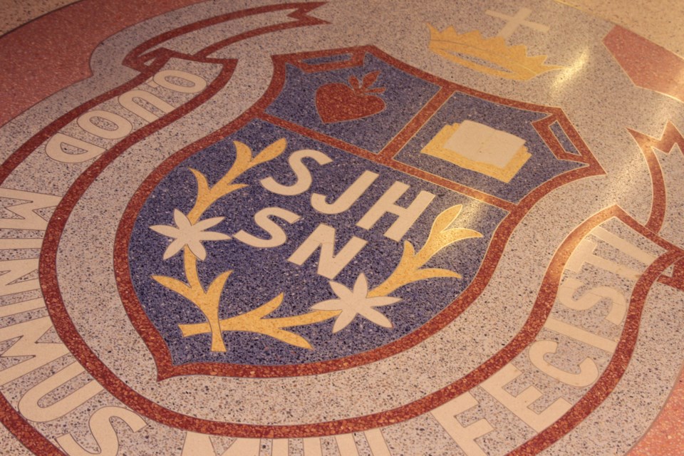 The St. Joseph's crest was developed by local tile worker 
Gerry Della Mattia and preserved from the now-demolished building for over 60 years. (Michael Charlebois, tbnewswatch)