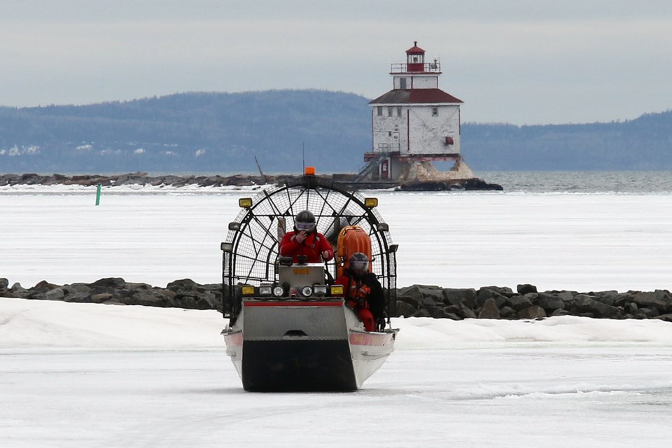 Thunder Bay Fire Rescue crews on Wednesday, April 1, 2020 used an airboat to retrieve a man trapped on the break wall in the city's harbour. (Leith Dunick, tbnewswatch.com)