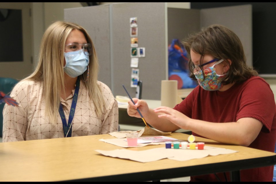 Grade 7 student, Chloe Tremonti, works with Amy Massalin, school-based behavior lead from Children’s Centre, during the school transition program to prepare for the new school year. (Photos by Doug Diaczuk - Tbnewswatch.com). 