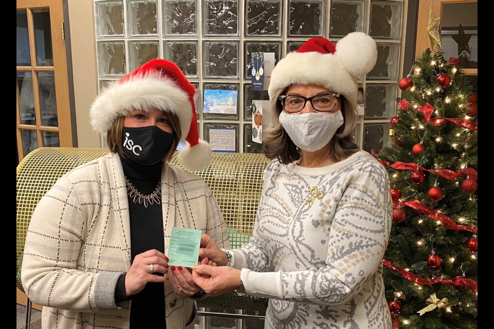 Stacey Ball (left), General Manager, Intercity Shopping Centre and Elaine Graydon (right), Manager, Special Events, Thunder Bay Regional Health Sciences Foundation, wish to thank all those who purchased tickets in this year's draw. Altogether the ISC 50/50 Cash Draw has raised over $250,000 for local healthcare in its 21-year history. (Photo supplied). 