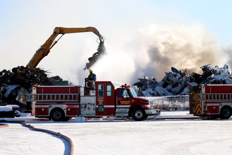 Thunder Bay Fire Rescue crews remain on the scene at Dutchak Recycle where a fire started in one of the scrap piles. (Photos by Doug Diaczuk - Tbnewswatch.com). 