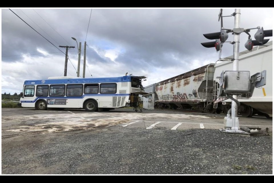 A City of Kenora transit bus was damaged in a collision at a railway crossing on Aug. 8, 2019 (TSB/photo courtesy Kenora Miner & News)