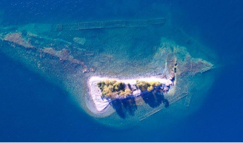 A modern aerial view of the islet  shows how Lake Superior reclaimed the mine site (Ontario Parks/Jeff Robinson)